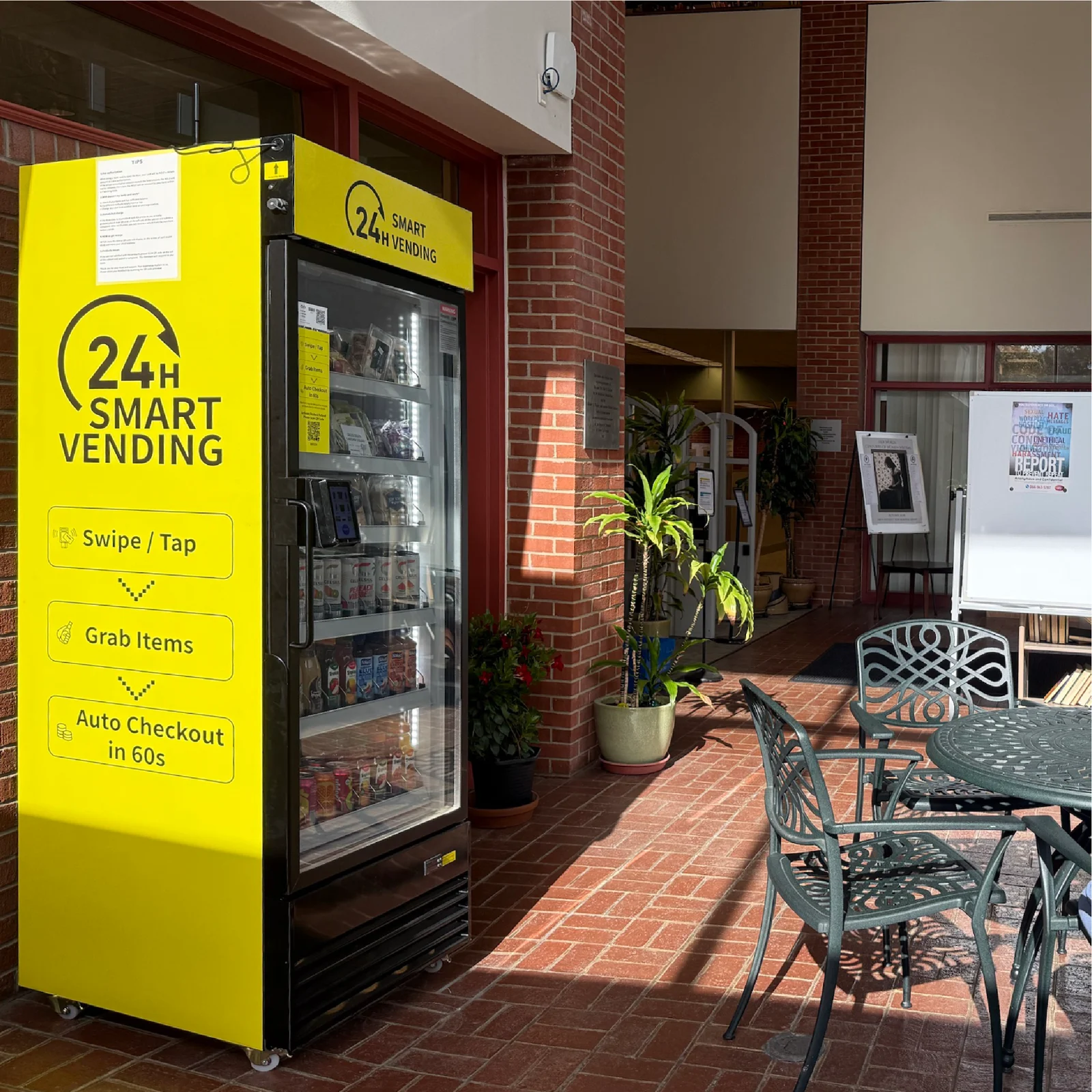 Smart cooler with a bright custom wrap in a public building lobby